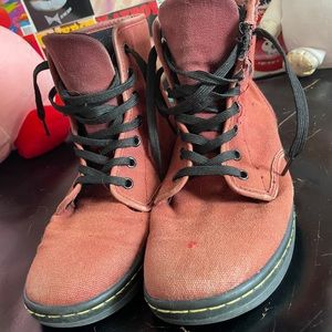 Very worn dr. Martens sneakers shoes